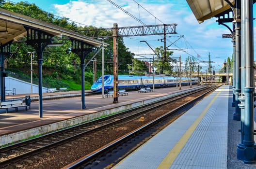 Train on railway platform in Gdansk-Poland, standing train set on tracks, railroad junction.