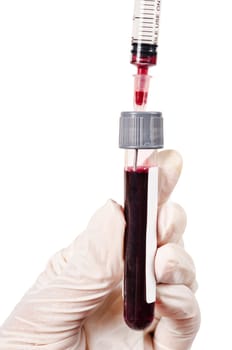 Hand doctor holding sample blood for test into blood tube from needle and syringe on white background.