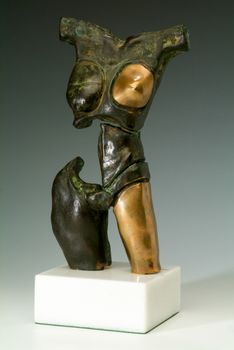 Metalic-gold shape of women sculpture