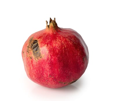 Ripe pomegranate fruit isolated on white background cutout