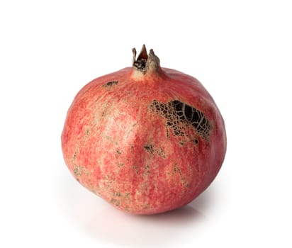 Ripe pomegranate fruit isolated on white background cutout