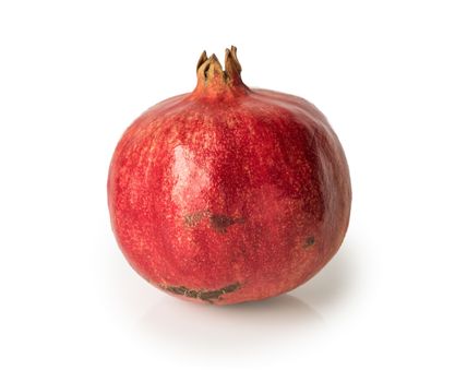 Ripe pomegranate fruit isolated on white background cutout