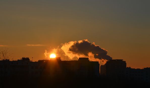 Sunset over the small town - bright photo