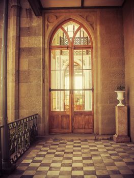 Glass door in old castle