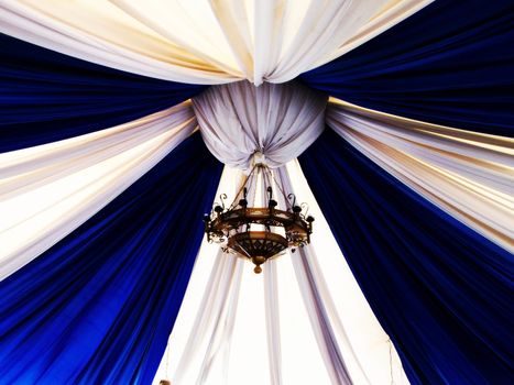 Luxury lamp with candlesticks and blue-white canopy