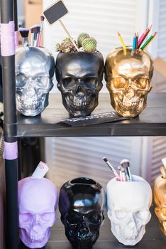 Containers in the shape of skulls for different objects