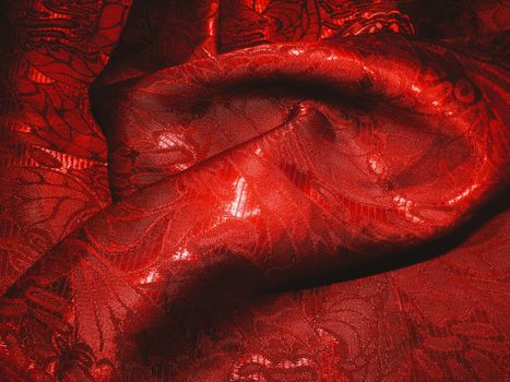 Crumpled red cloth as texture and background