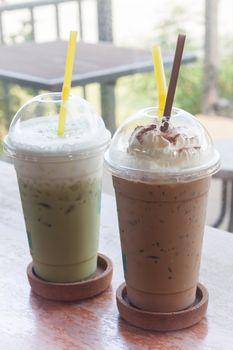 Iced coffee with iced green tea in coffee shop, stock photo