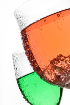 Liquid in the glass on a studio background