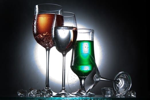 Liquid in the glass on a studio background