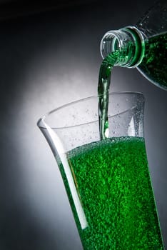 Glasses and beverages on a studio background