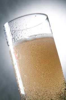 Glasses and beverages on a studio background