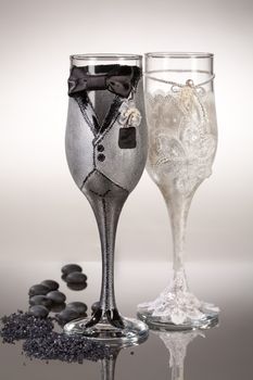 Wineglasses with painting on a glass studio background