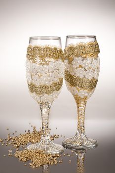 Wineglasses with painting on a glass studio background