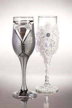 Wineglasses with painting on a glass studio background