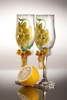 Wineglasses with painting on a glass studio background