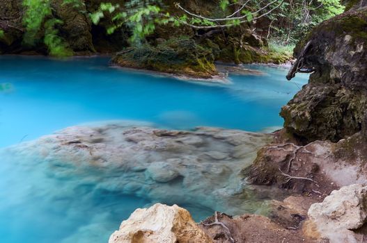 Urederra River (Navarra, Spain) takes an amazing blue color near its spring.