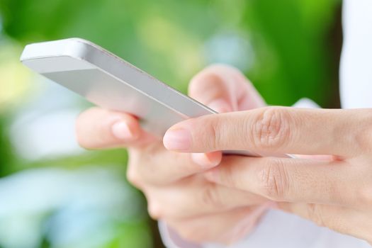 Image of Woman hand Using a Smart Phone background,communication