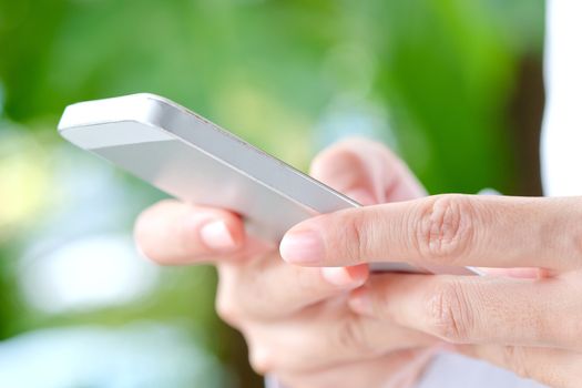 Image of Woman hand Using a Smart Phone background,communication