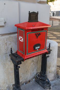Mail box red. Budapest, Hungary. Red letterbox in Budapest.