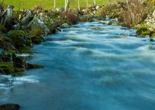 Flowing river water a rainy day