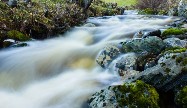 Flowing river a rain day in Norway