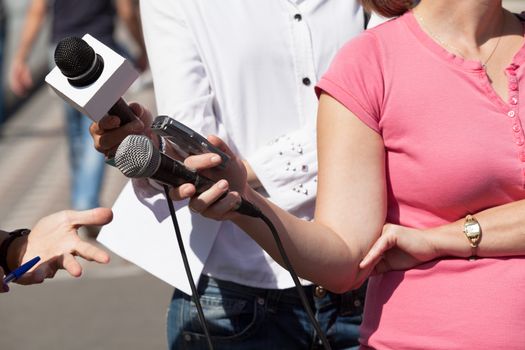 Reporters making media interview