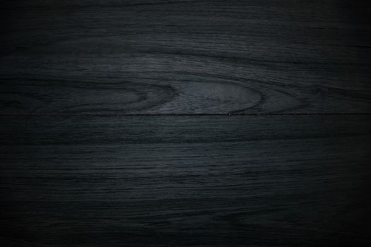 Texture of wood background and smooth a plate. dark black color tone