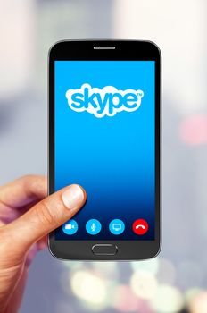 KYIV, UKRAINE - OCTOBER 28,2016: SAMSUNG with Skype application on the screen. Skype is an application that providing text chat, video chat and voice calls