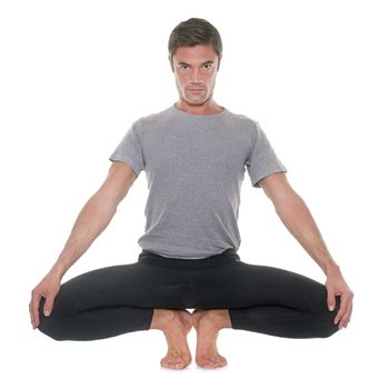 yoga man in front of white background