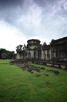 SIEM REAP, CAMBODIA - OCT 20, 2016: The famous Angkor Wat near Siem Reap, Cambodia. The temple was hidden for many years and covered by the rain forest.