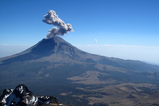 Active Popocatepetl volcano in Mexico, one of the highest mountains in the country