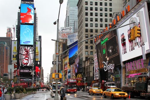 New York, NY, USA - October 09, 2012: Times Square, featured with Broadway Theaters and huge number of LED signs, is a symbol of New York City and the United States, October 09, 2012 in Manhattan, New York City