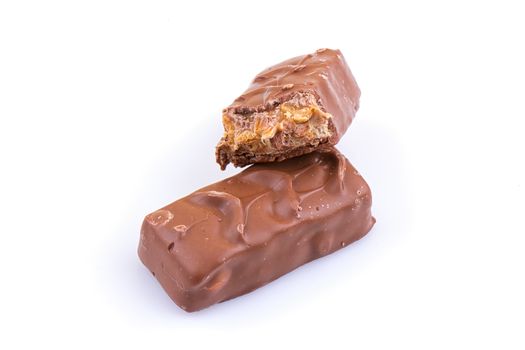 Chocolate bar with caramel isolated on white