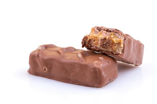 Chocolate bar with caramel isolated on white