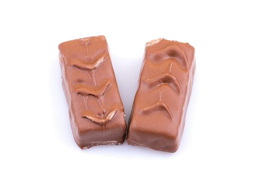 Chocolate bar with caramel isolated on white
