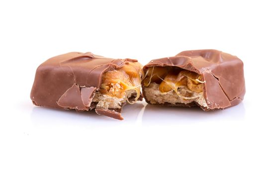 Chocolate bar with caramel isolated on white