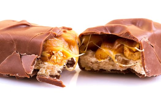 Chocolate bar with caramel isolated on white