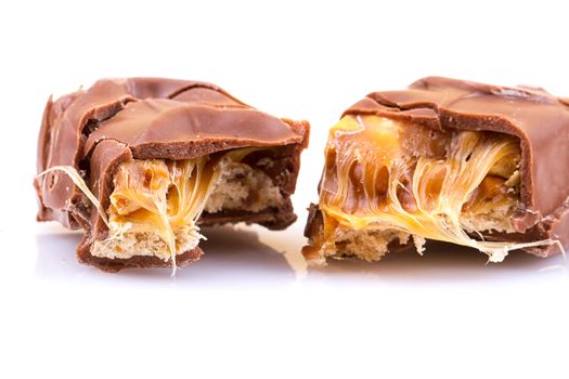 Chocolate bar with caramel isolated on white