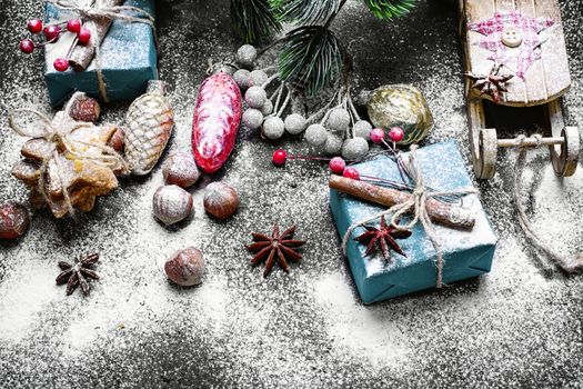 Box with Christmas present and Santa Claus's sledge