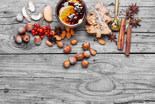 glass of mulled wine and spice rack for beverage