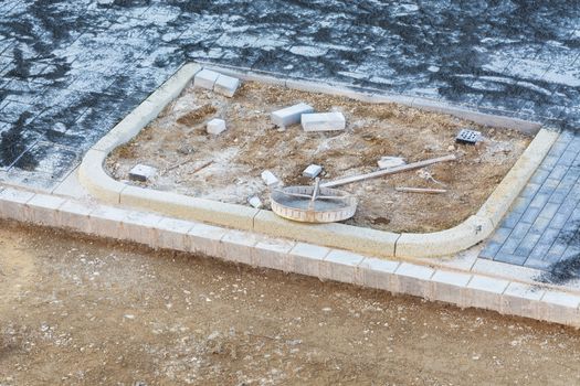 A new channel cover in the concrete foundation.
