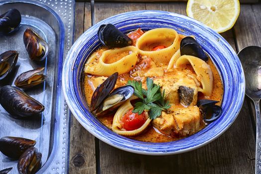 seafood soup with tomato sauce,mussels and pasta