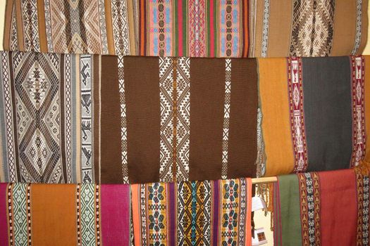 Details shot of wool fabric with colorful pattern, inca indian pattern.