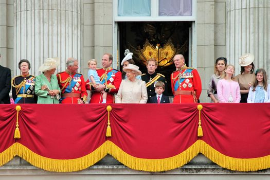 LONDON, UK - JUNE 13: The Royal Family appears on Buckingham Palace balcony during Trooping the Colour ceremony, also Prince Georges first appearance on balcony, on June 13, 2015 in London