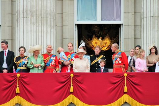 LONDON, UK - JUNE 13: The Royal Family appears on Buckingham Palace balcony during Trooping the Colour ceremony, also Prince Georges first appearance on balcony, on June 13, 2015 in London