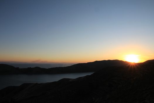 Sunset on the Island of the Sun, Titicaca Lake, among the most scenic travel destination in Bolivia.