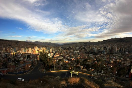 Panorama of night La Paz, Bolivia, Illimani mountain in the Background