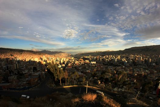 Panorama of night La Paz, Bolivia, Illimani mountain in the Background