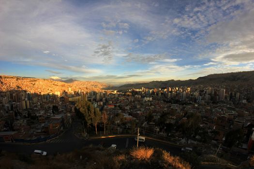 Panorama of night La Paz, Bolivia, Illimani mountain in the Background